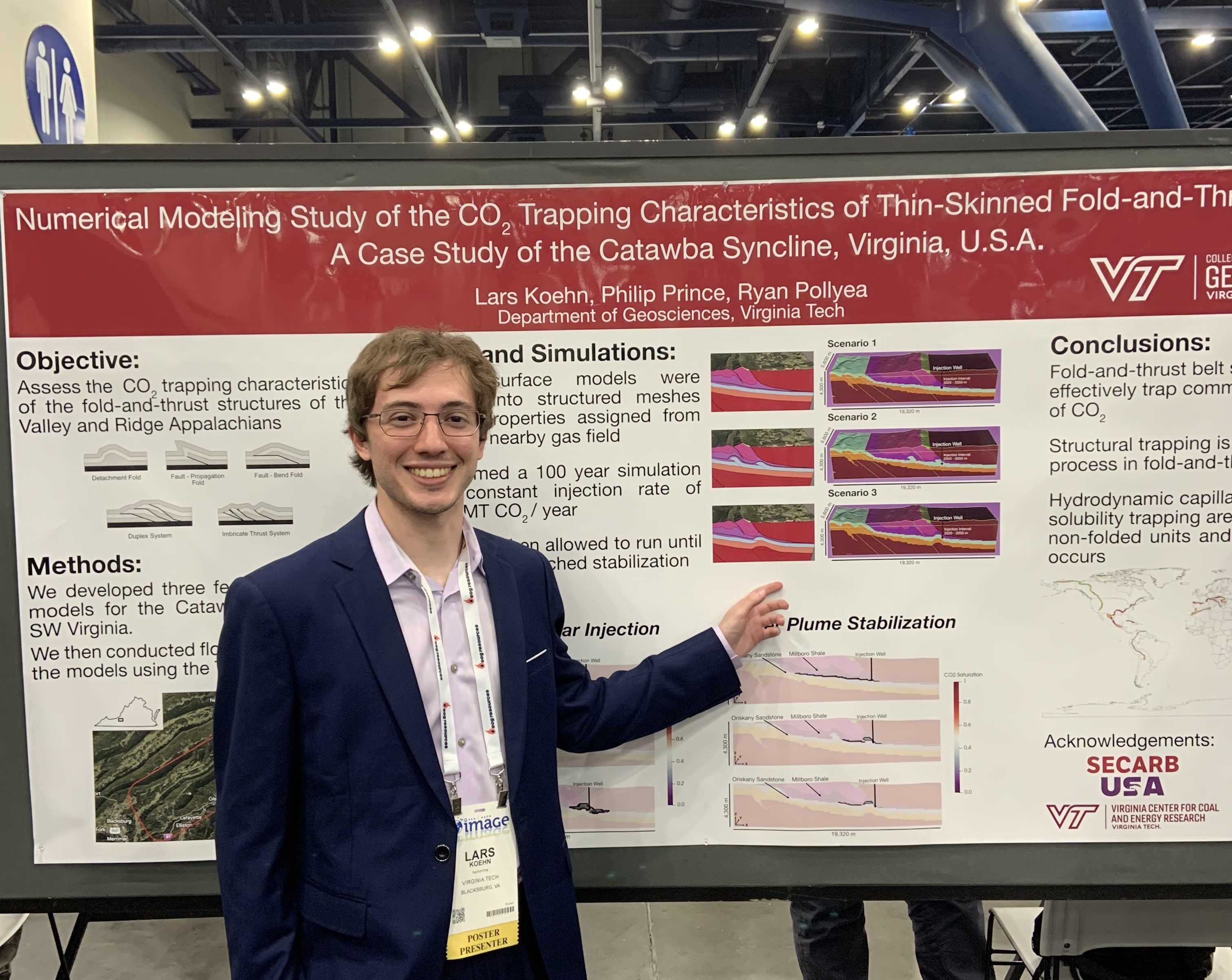 Lars Koehn showing poster